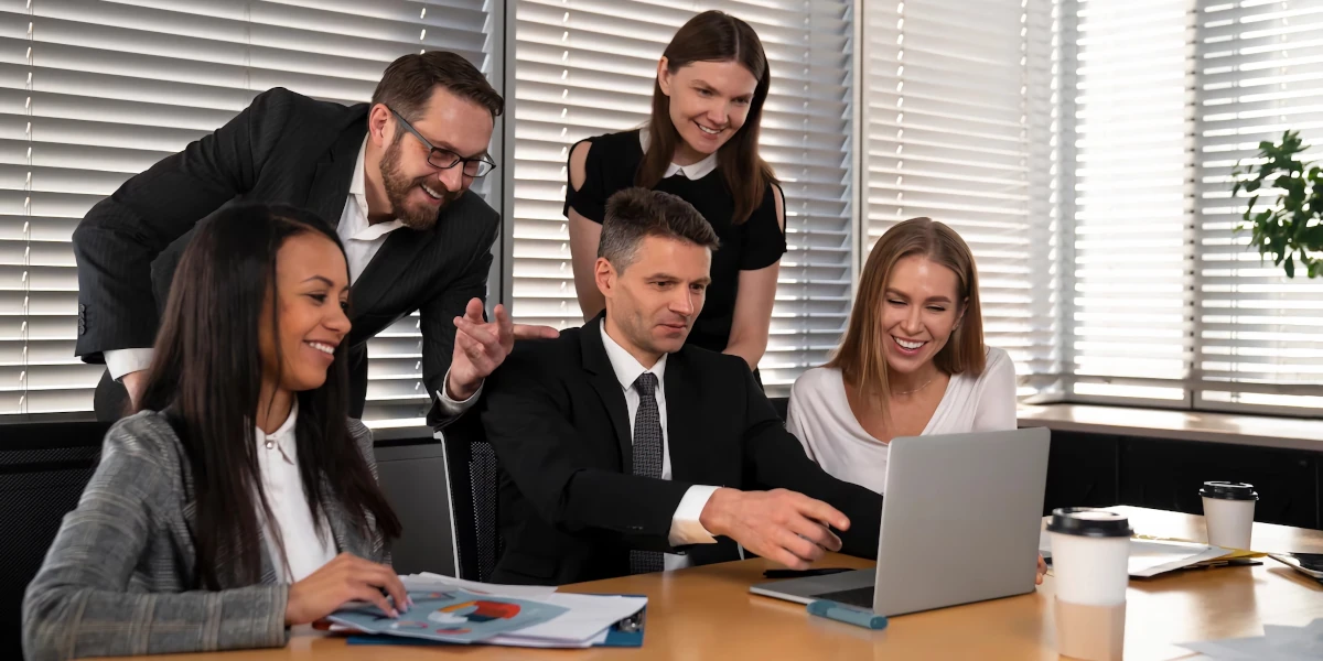 Consulting team reviewing a website together